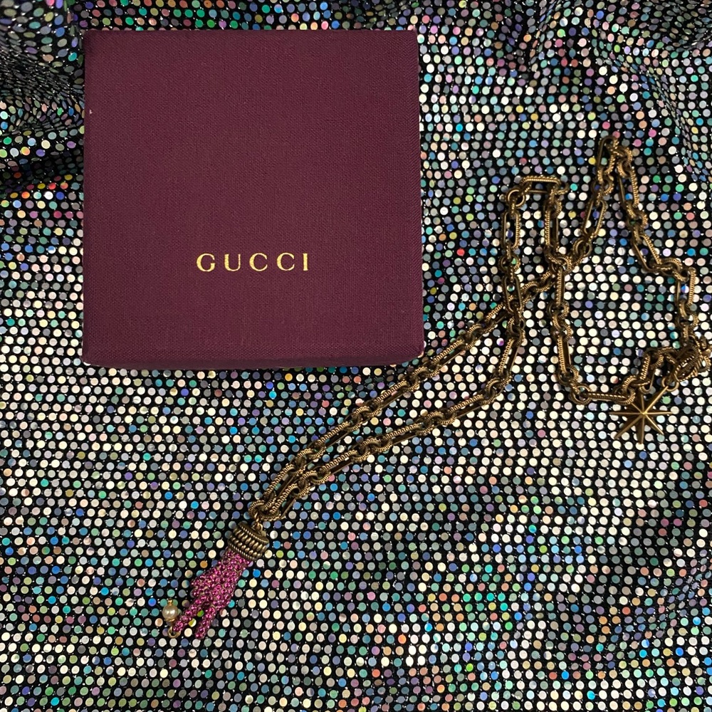 Gucci peace sign necklace